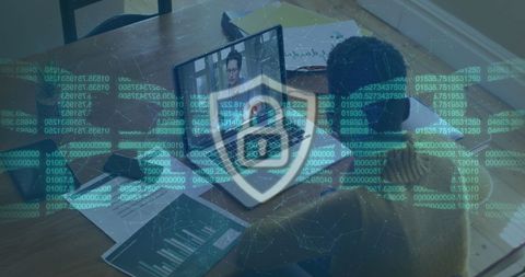 Cyber security overlay with business meeting on laptop