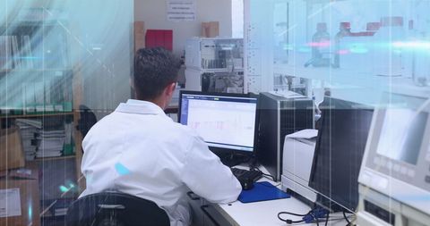 Scientist in Laboratory Analyzing Data on Computer - Download Free Stock Images Pikwizard.com