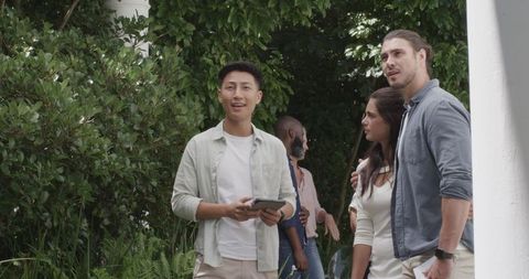 Guests Mingling at Joyous Garden Wedding Celebration