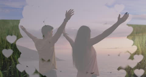 Joyful Friends Celebrating at Beach with Floating Heart Animation