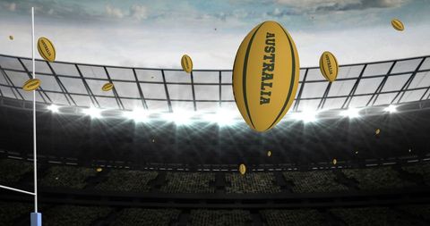 Dynamic Scene of Rugby Balls at Stadium Illuminated