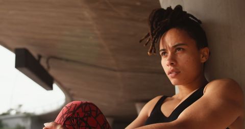 Focused Woman Exercising Outdoors for Health and Well-being