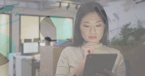 Strategic Businesswoman Analyzing Digital Data Visualizations