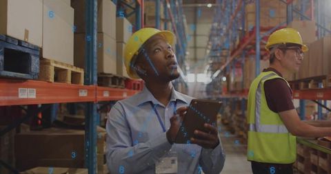 Warehouse Supervisor Inspecting Inventory with Tablet and Digital Overlay in Logistics Hub