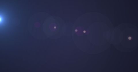 Abstract Blue Light Spots and Purple Particles on Dark Background - Download Free Stock Images Pikwizard.com