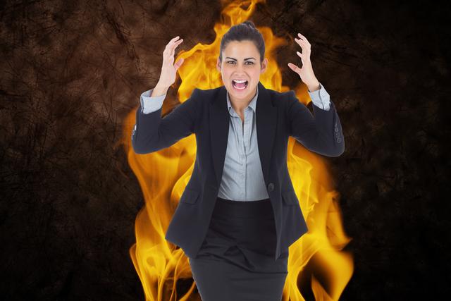 Angry businesswoman experiencing workplace stress with flames in background. Highlight frustration, pressure in business environment. Use for stress management, workplace conflict resolution, or mental health awareness.