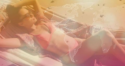 Woman Relaxing on Beach Chair in Pink Bikini With Sunglasses