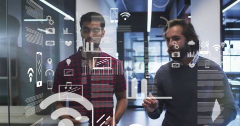 Diverse Professionals Discussing Digital Strategy with Virtual Icons