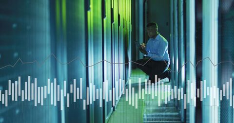 IT Engineer Managing Data Servers with Digital Data Overlay - Download Free Stock Images Pikwizard.com