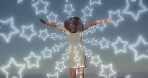 Woman Embracing Freedom on Beach with Starry Visuals