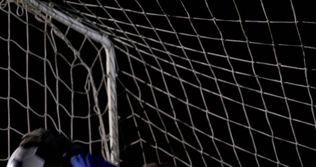 Soccer Goalkeeper Saving Ball During Night Match - Download Free Stock Images Pikwizard.com