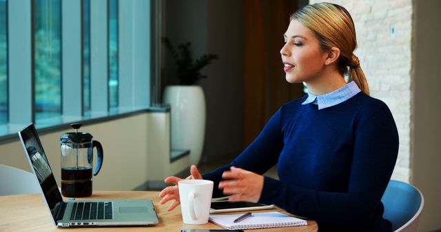 Businesswoman Engaging in Virtual Meeting - Download Free Stock Images Pikwizard.com