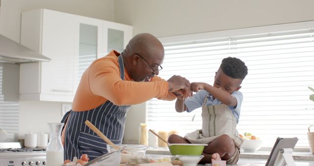 Grandfather and Grandson Baking Together in Kitchen - Download Free Stock Images Pikwizard.com