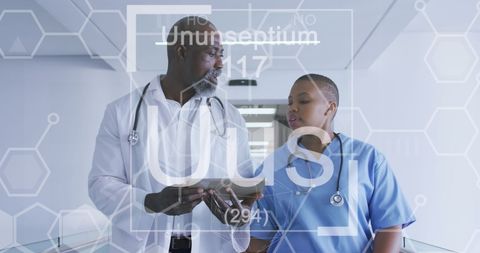 African American Doctors Collaborating with Technology and Medicine Symbols