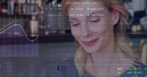 Businesswoman Analyzing Market Data in Modern Cafe Environment