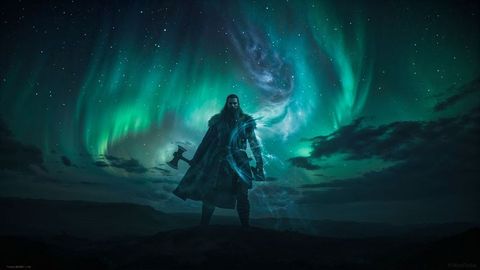 Bearded viking warrior channeling magic beneath mesmerizing aurora