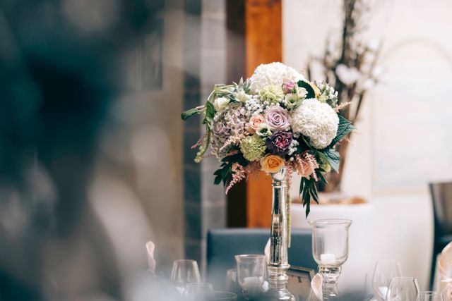Elegant Flower Arrangement in Glass Vase at Wedding Reception - Download Free Stock Photos Pikwizard.com