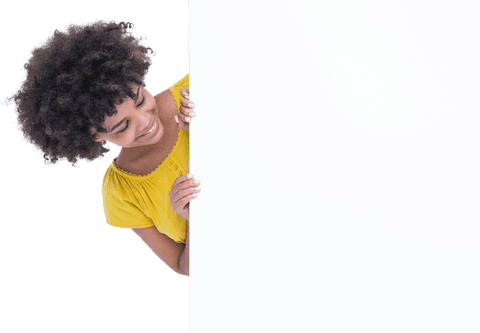 Smiling woman curly hair peeking out from blank transparent sign