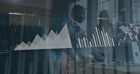 Diverse Team Collaborating with Financial Data Interfaces in Modern Office