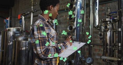 Technician Conducting Quality Control in Modern Brewery