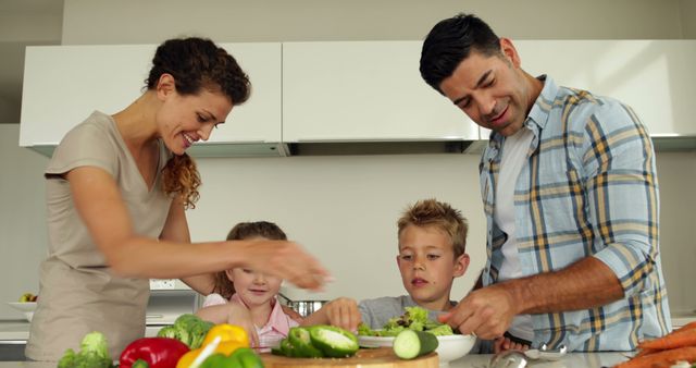 Healthy Family Cooking Together in Modern Kitchen - Download Free Stock Images Pikwizard.com