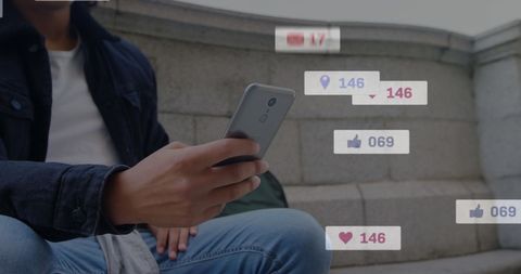 Social Media Interaction Concepts with Young Man Using Smartphone