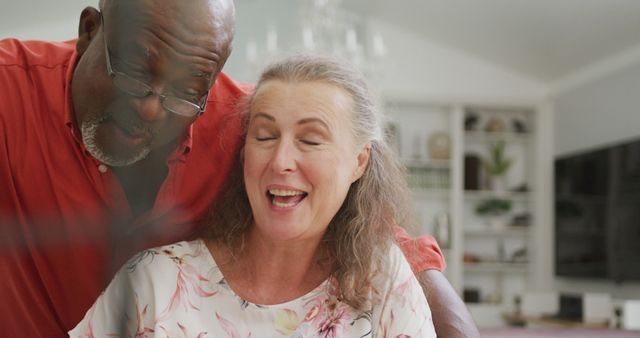 Happy Senior Couple Sharing a Joyful Moment at Home - Download Free Stock Images Pikwizard.com