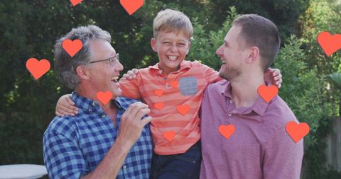 Happy Three Generation Family Hugging in Garden