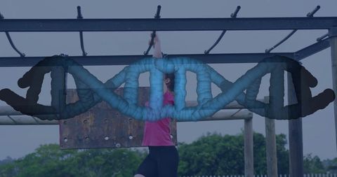 Energetic Woman at Outdoor Playground with DNA Fitness Concept