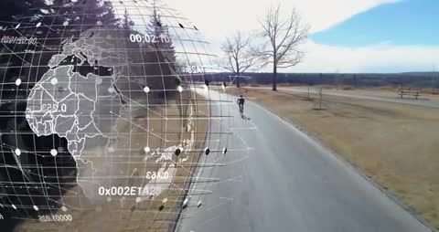 Cyclist on Park Trail with Digital Globe and Technology Data Overlay