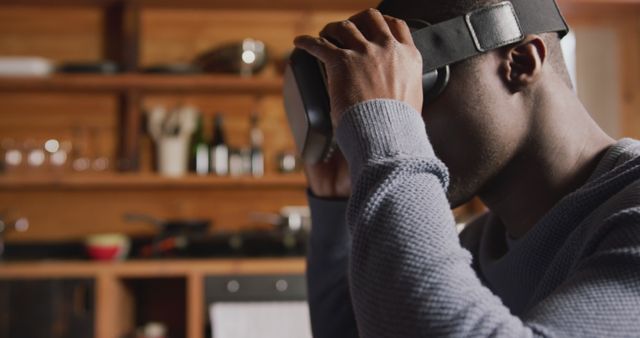 Man Engaging in Virtual Reality in Modern Kitchen - Download Free Stock Images Pikwizard.com