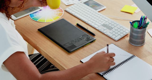 Graphic Designer Working on Color Palette Concept at Desk - Download Free Stock Images Pikwizard.com