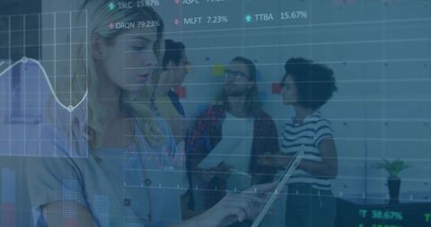 Female Analyst Tapping Tablet While Team Collaborating with Modern Data Dashboard Overlay