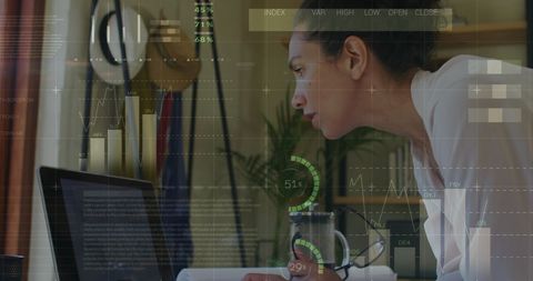 Focused Businesswoman Analyzing Digital Financial Data in Office - Download Free Stock Images Pikwizard.com
