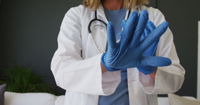 Healthcare Professional Wearing Blue Gloves Preparing for Procedure - Download Free Stock Images Pikwizard.com