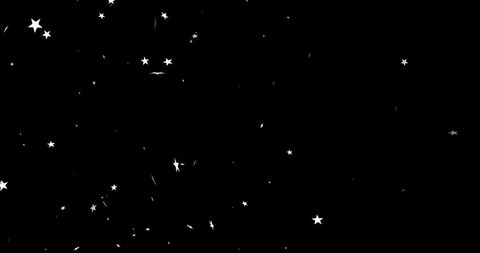Falling stars on black festive background