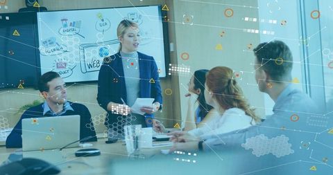 Business team analyzing data and concepts with digital interface