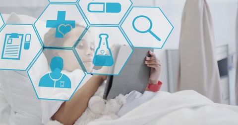 Young Patient in Hospital Room with Digital Medical Interface Graphics