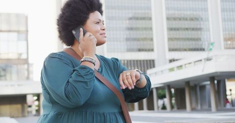 Confident Woman Connecting via Smartphone Outdoors