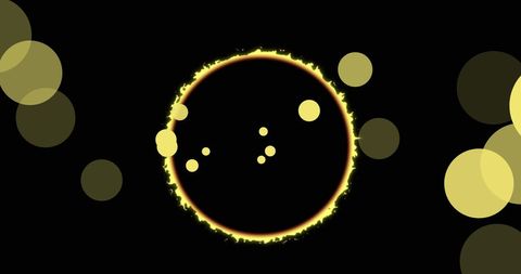 Dynamic yellow light circles on black background