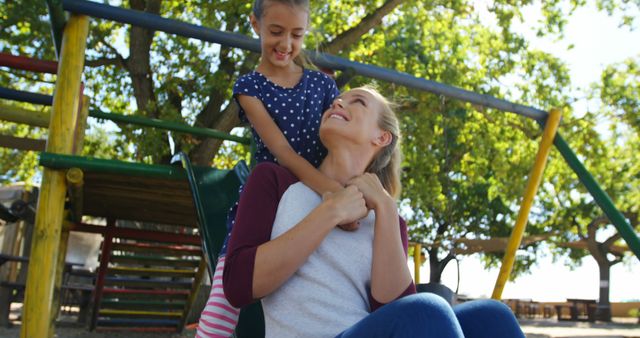 Mother and Daughter Enjoying Playtime in Park - Download Free Stock Images Pikwizard.com