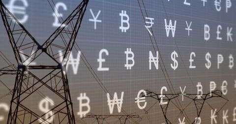 Framing power transmission pylons with floating crypto and currency symbols at dusk