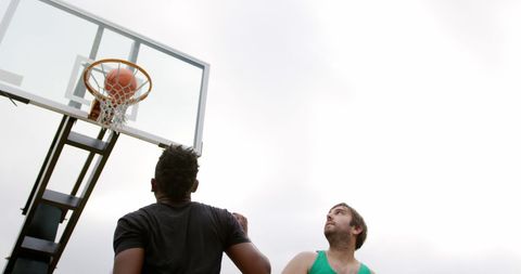 Diverse Basketball Players Compete on Outdoor Court - Download Free Stock Images Pikwizard.com
