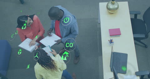 Diverse Coworkers Collaborating on Sustainable Business Solutions