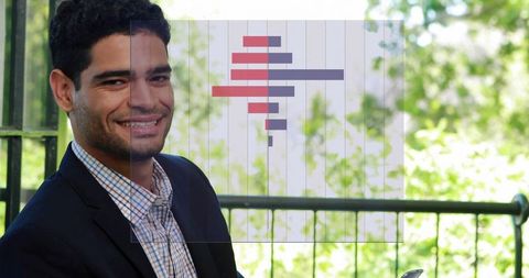 Businessman analyzing financial data on smartphone in outdoor setting