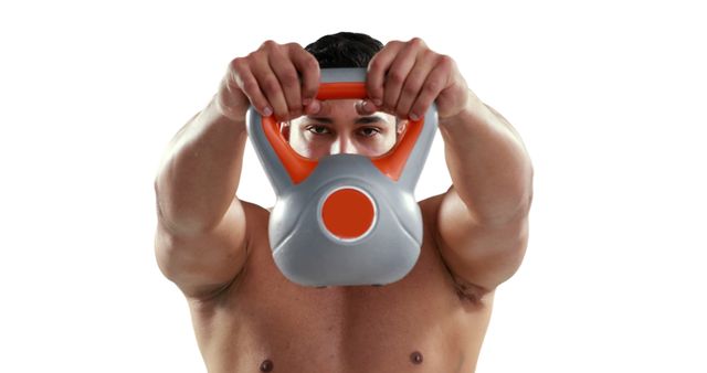 Close-Up of Fit Man Lifting Kettlebell During Workout - Download Free Stock Images Pikwizard.com