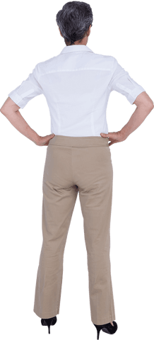 Back view of confident businesswoman standing on transparent background