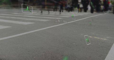 Pedestrians Crossing Street with Augmented Reality Icons