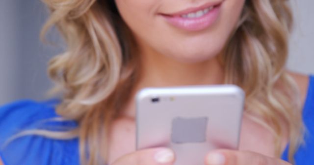 Close-up of Woman Smiling While Using Smartphone - Download Free Stock Images Pikwizard.com