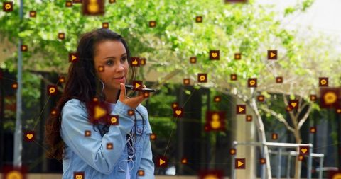 Woman engaging with social media via voice on smartphone